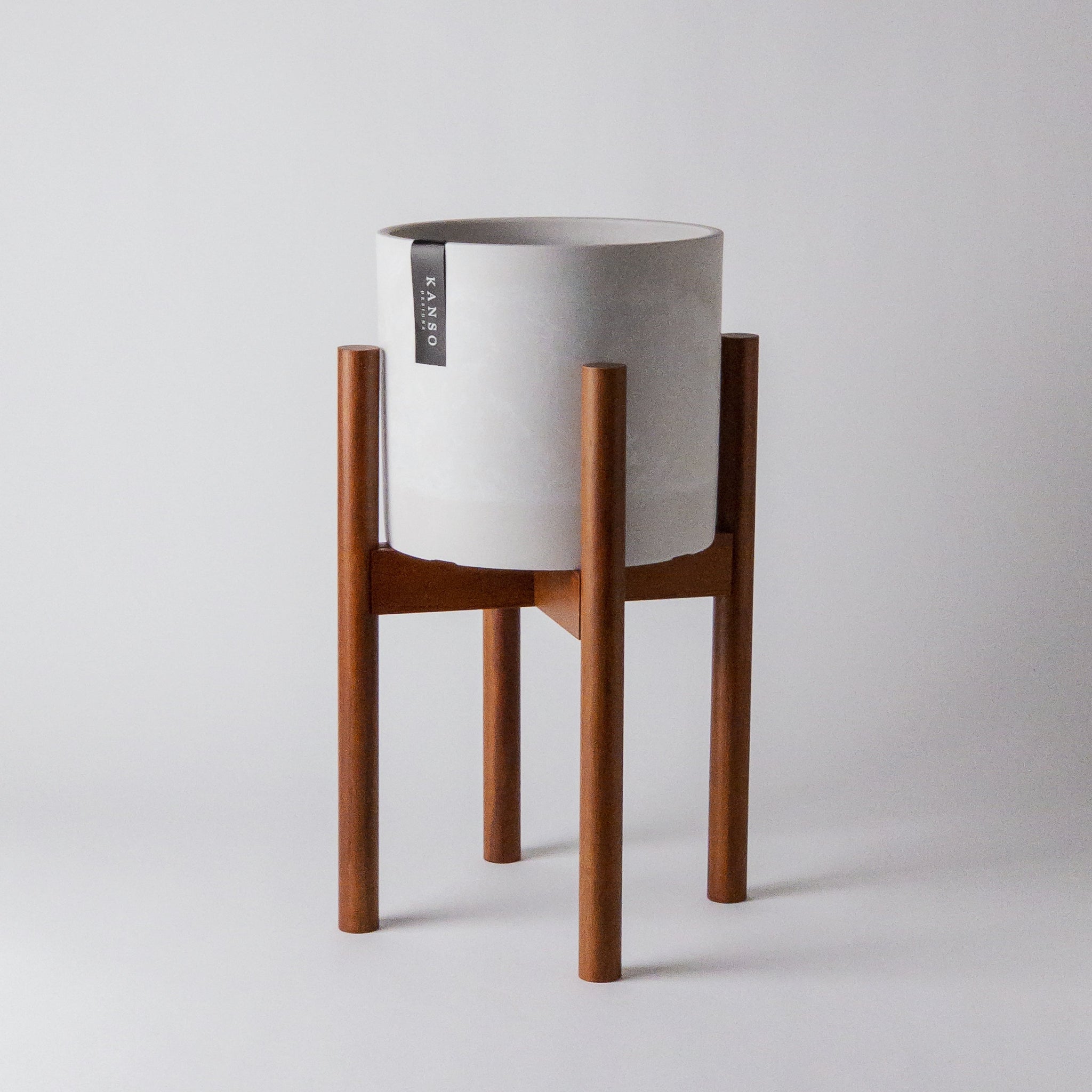 dark wood plant pot Adjustable Dark Bamboo Plant Stand – Kanso Designs